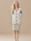 Women's embroidered cardigan sweater with button front, twisted knit jacket with pockets.