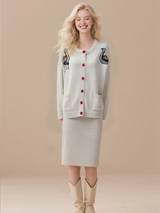 Women's embroidered cardigan sweater with button front, twisted knit jacket with pockets.